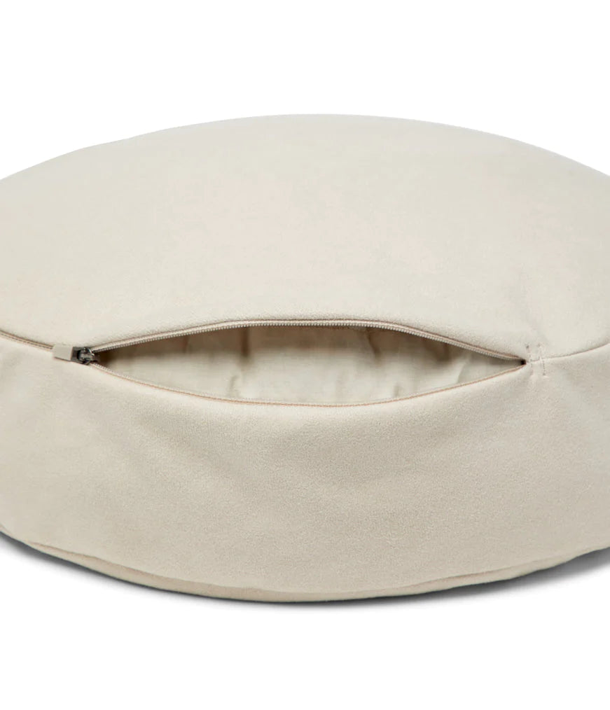 High-quality Manduka Meditation Cushion in serene hues - your ideal companion for peaceful and comfortable meditation sessions.