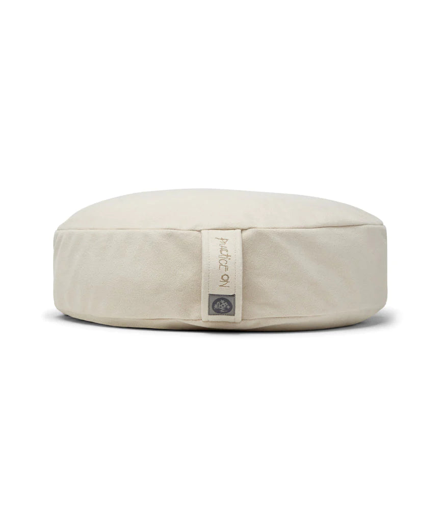 Premium Manduka Meditation Cushion in soothing colors - the perfect aid for your meditation practice, providing comfort and proper posture support.