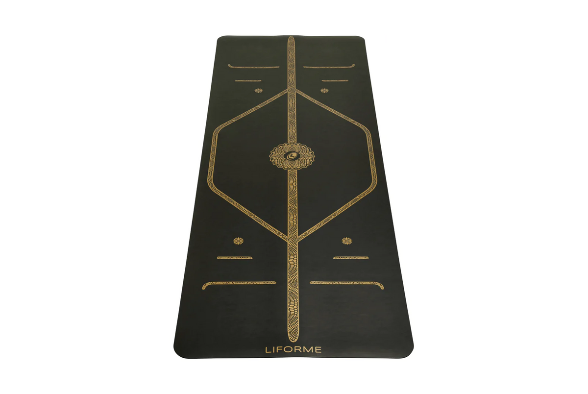 Eco-friendly yoga mat with gold alignment markers - Liforme Black & Gold Yoga Mat.